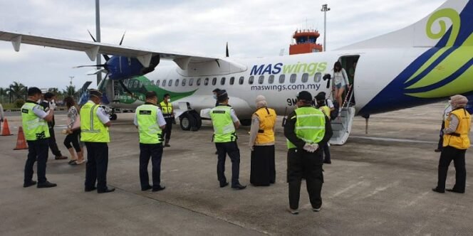 
					Pemeriksaan Suhu Penumpang MASWings dari Tawau di Bandara Juwata Tarakan Awal Pandemi Covid-19 Tahun 2020 Lalu. Foto: doc 