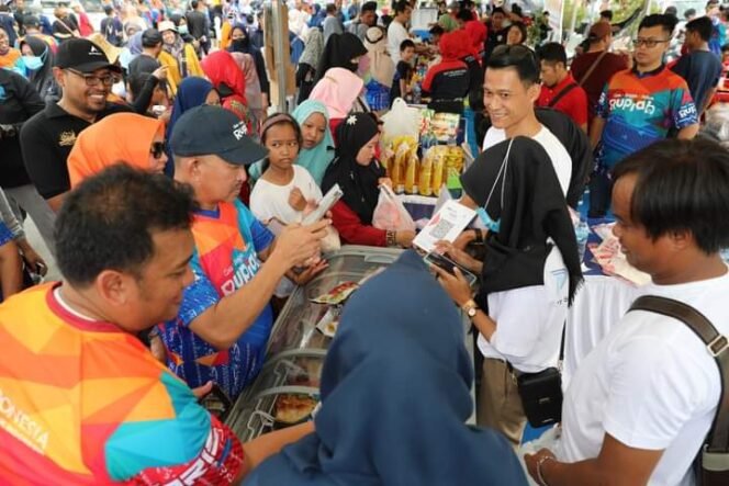 
					Walikota Tarakan dr. Khairul menghadiri peresmian program Kaltara Digital pakai QRIS. Foto : Humas.