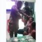 Salah satu petugas Pol PP yang terlihat di video, tampak menunjukkan 12 kg barang bukti. (Foto: Ist)