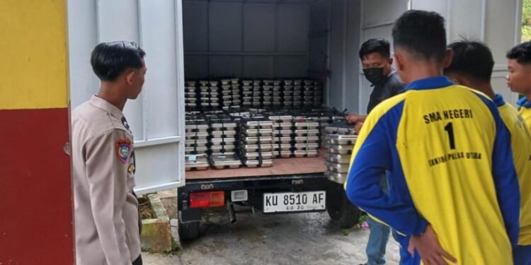 Pastikan Distribusi Lancar, Personel Polsek Tanjung Palas Utara Pantau Distribusi MBG 