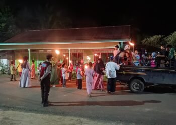 Personel Polsek Tanjung Palas Utara Amankan Pawai Obor di Desa Karang Agung