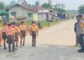 Amankan Lomba Gerak Jalan HUT ke-81 RI di Desa Long Beluah, Polsek Tanjung Palas Barat Siagakan Personel