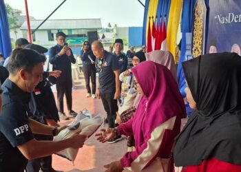 Ringankan Beban Pangan Warga Tarakan, NasDem Kaltara Salurkan 1.100 Beras Premium