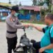 Tanggap Bahaya Kabut Asap, Polsek Sekatak Bagikan Masker Gratis untuk Pengendara di Trans Kaltara